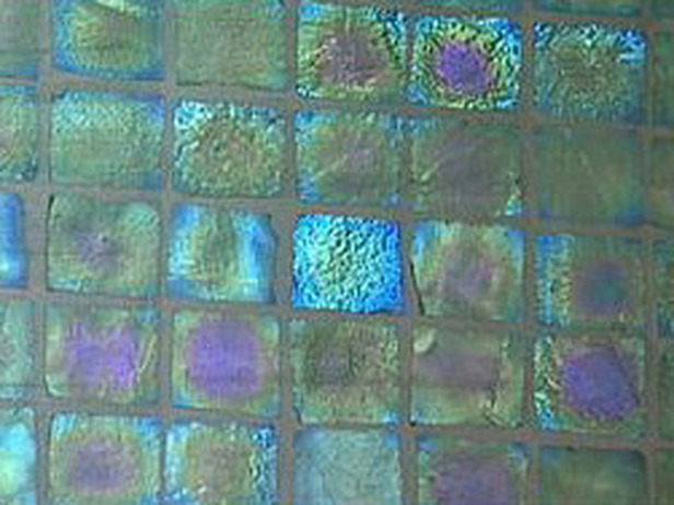 Glass tiles can have a glossy or tumbled finish, and come in a variety of formed shapes.
